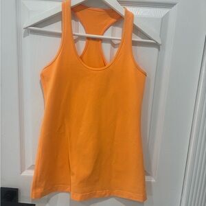20. Lululemon Cool Racerback Tank
Top Orange,  Size They can be a 6 or 8